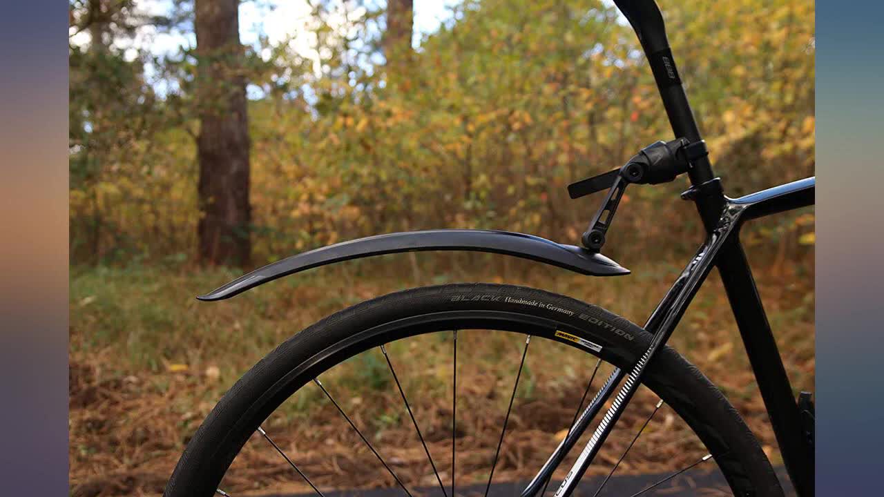 A shot showing the mudguard installed on a bike, highlighting the size.