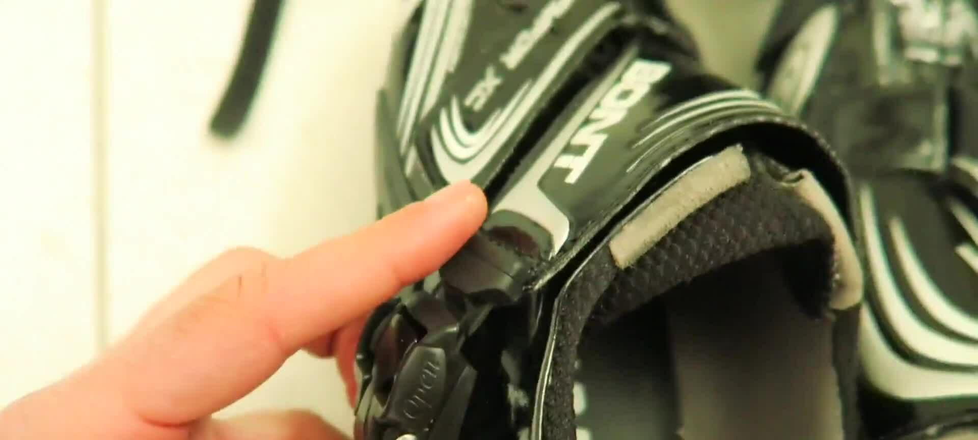 Close-up shot of the original buckles digging into the foot