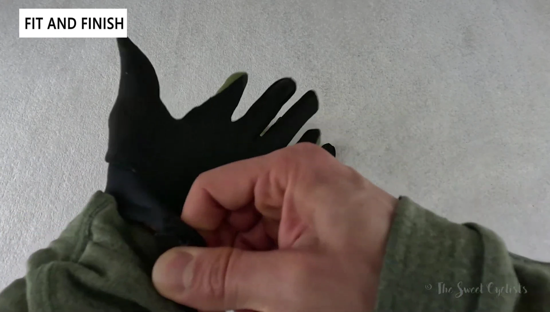 Person putting on Ignite glove