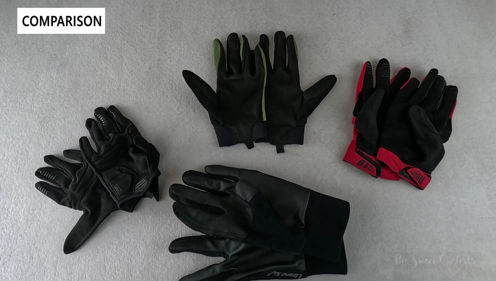 All three gloves displayed together