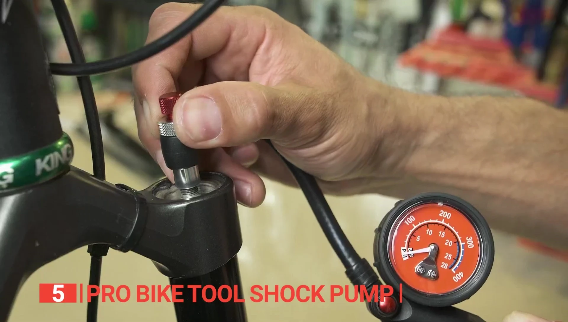 The Pro Bike Tool shock pump with its T-handle and hose.
