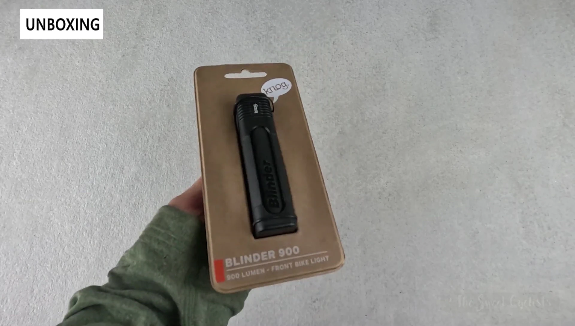 Close-up of the packaging showing the hidden compartment for accessories.