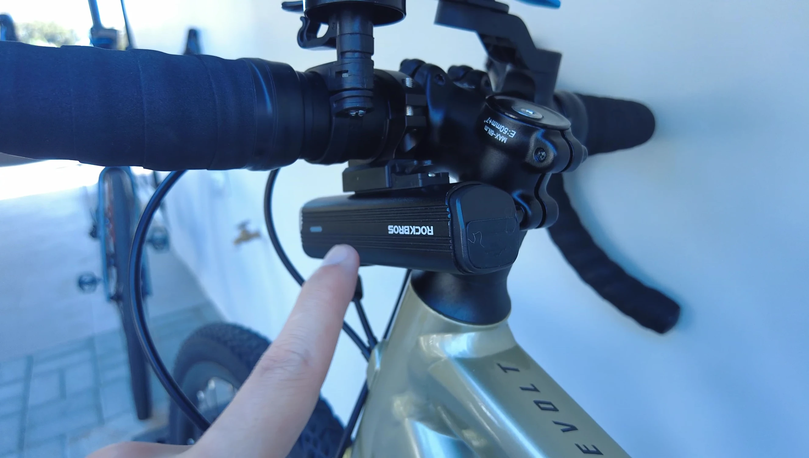 The USB-C charging port on the bike light.