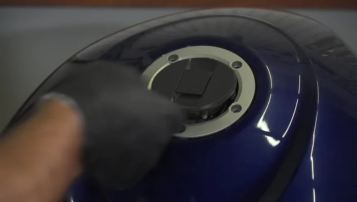 Dispose of the old gasoline properly.