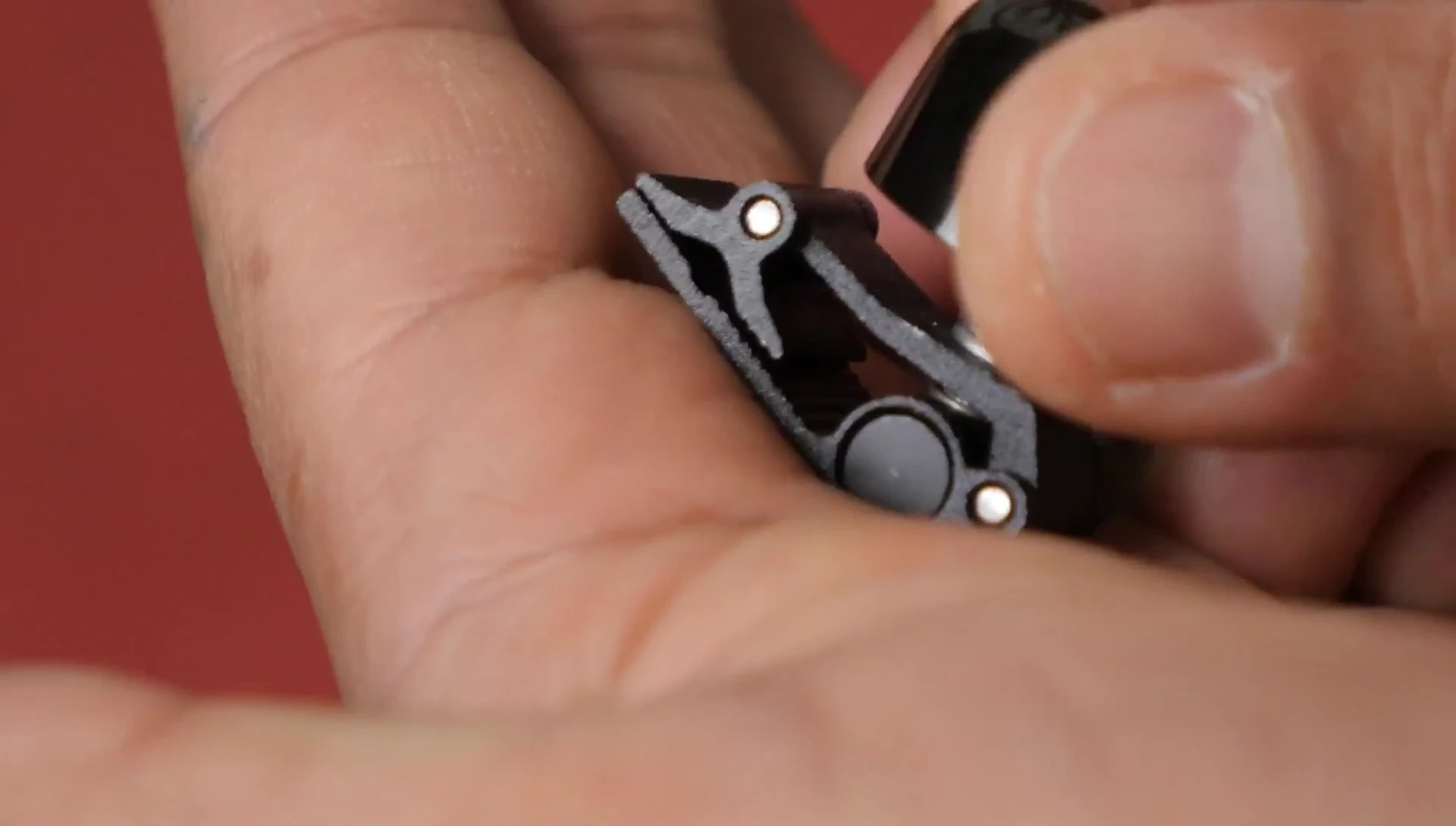 The Osaka Roadie Bell clipped onto a bike cable
