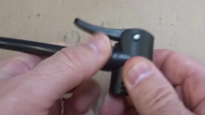 Pull off the lever and push out the internal parts (plastic parts, ball, gaskets) using a punch.