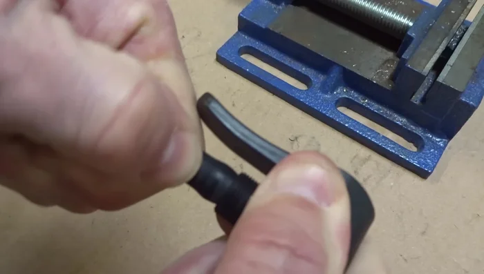 Reattach the pump head to the pump hose and tighten.