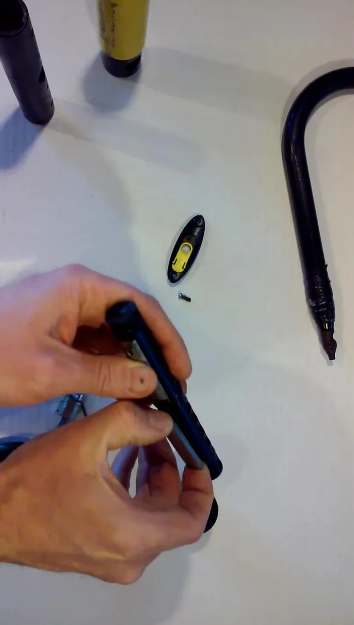 Carefully remove the spring-loaded components.