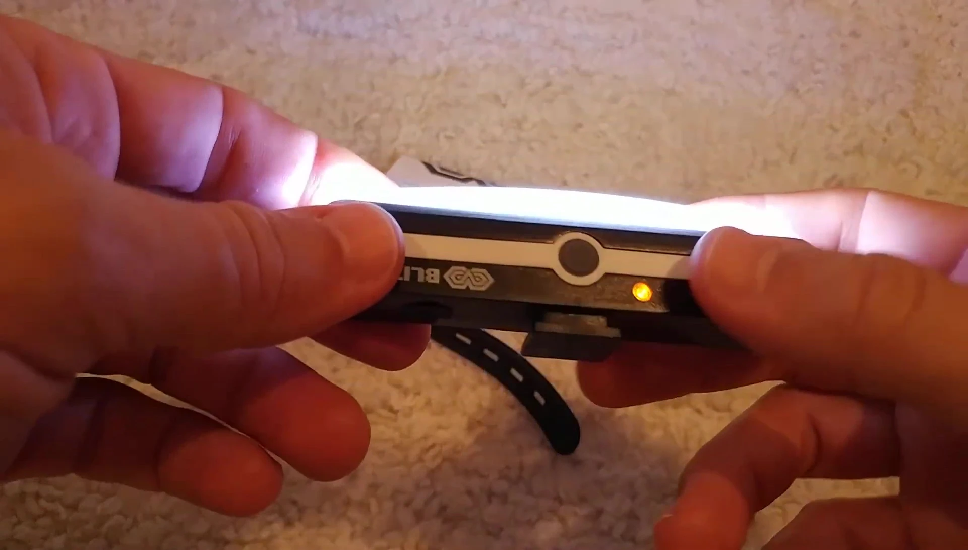 Close-up of the bike light showcasing its bright beam.