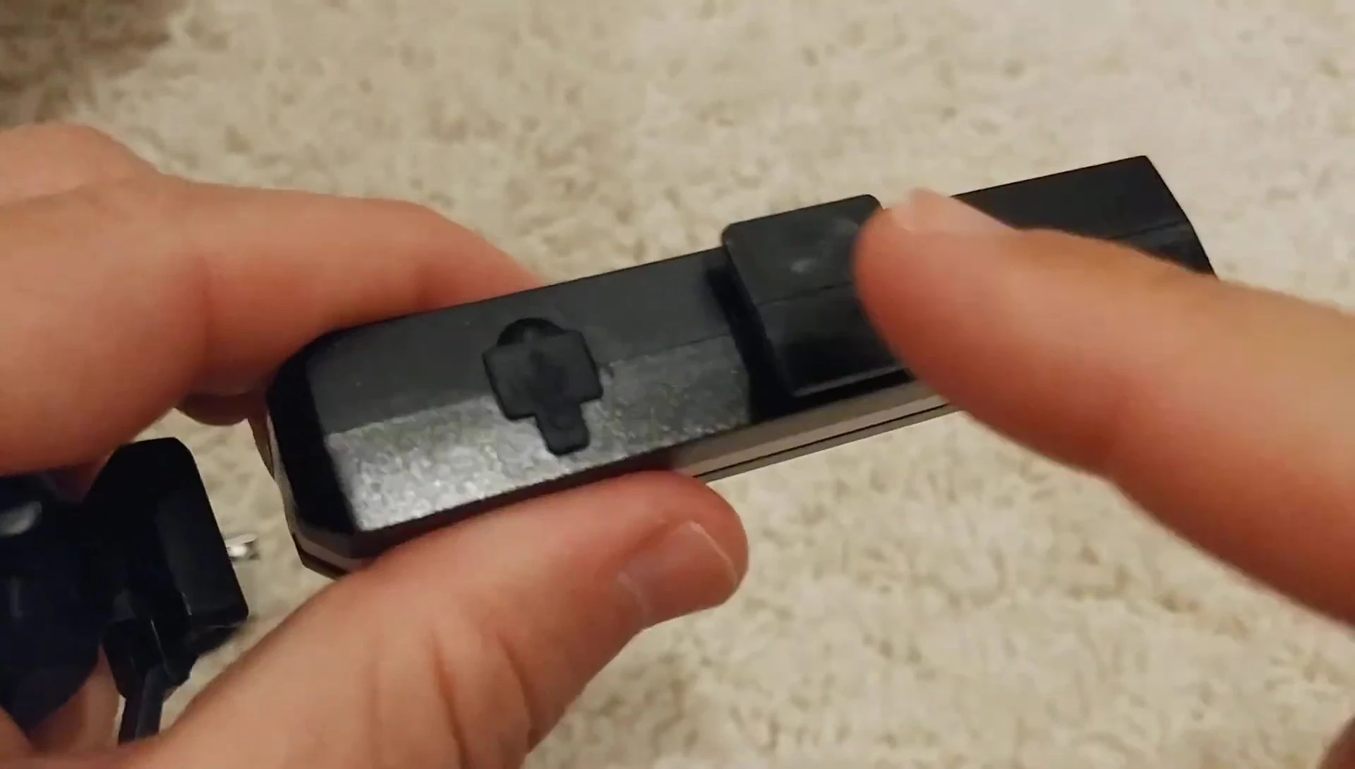 The reviewer points out the square base design that allows for various mounting positions.