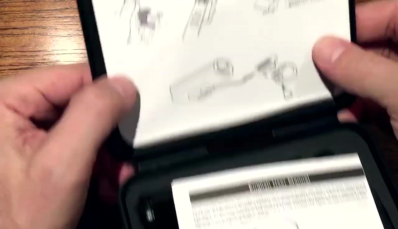 The contents of the box, including the manual and mounts
