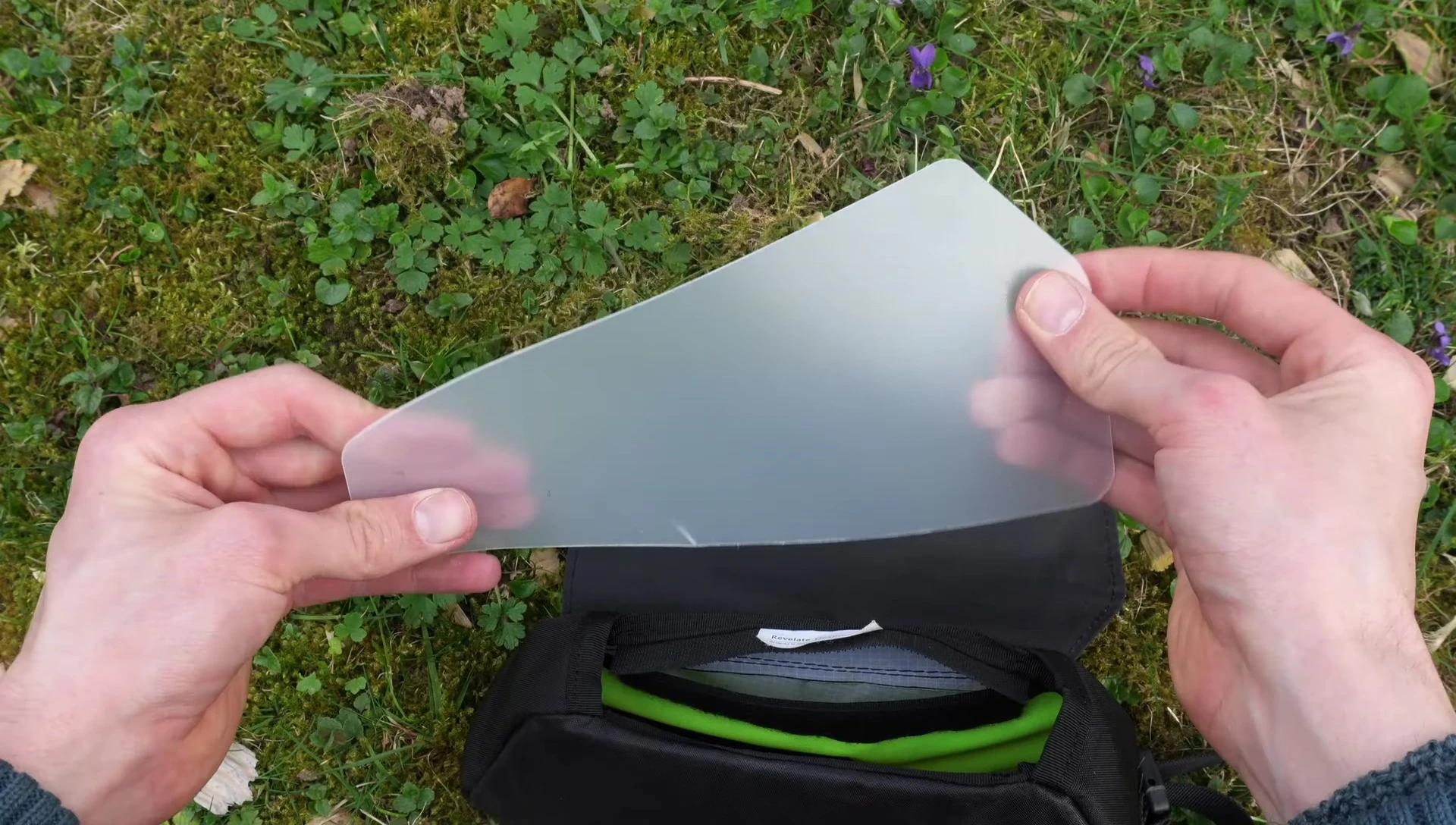 The padded bottom and hard plastic inlays highlighted.