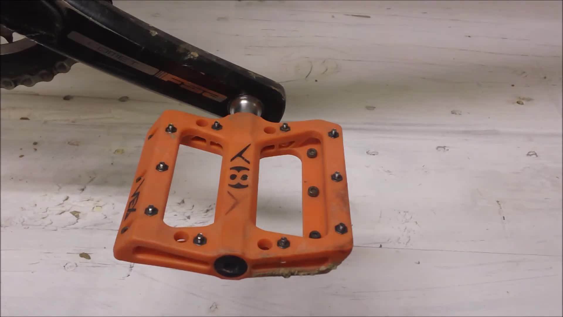 A view of the orange Origin8 Vex pedals