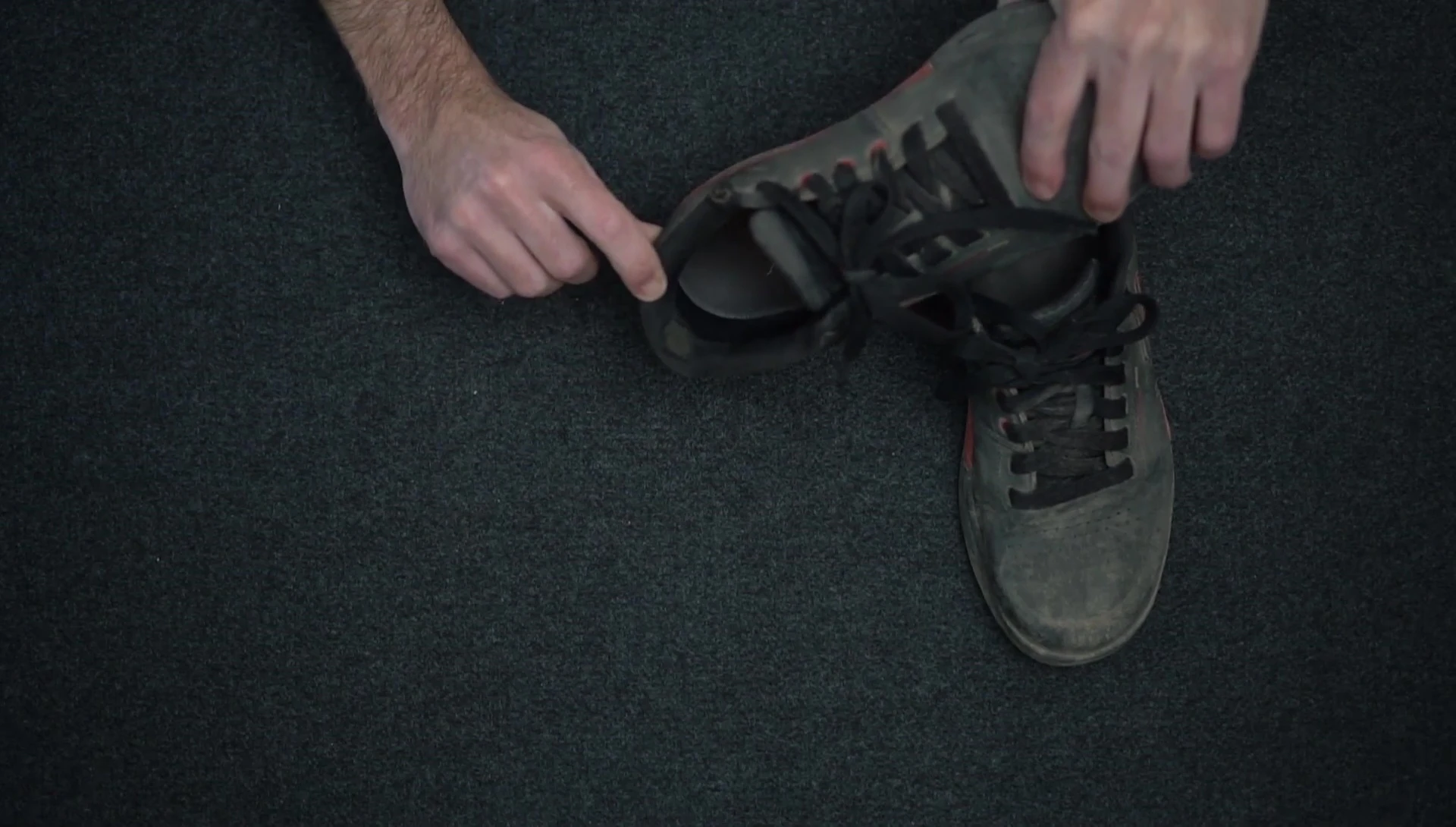 Close-up of the heel area showcasing abrasion from pedaling.