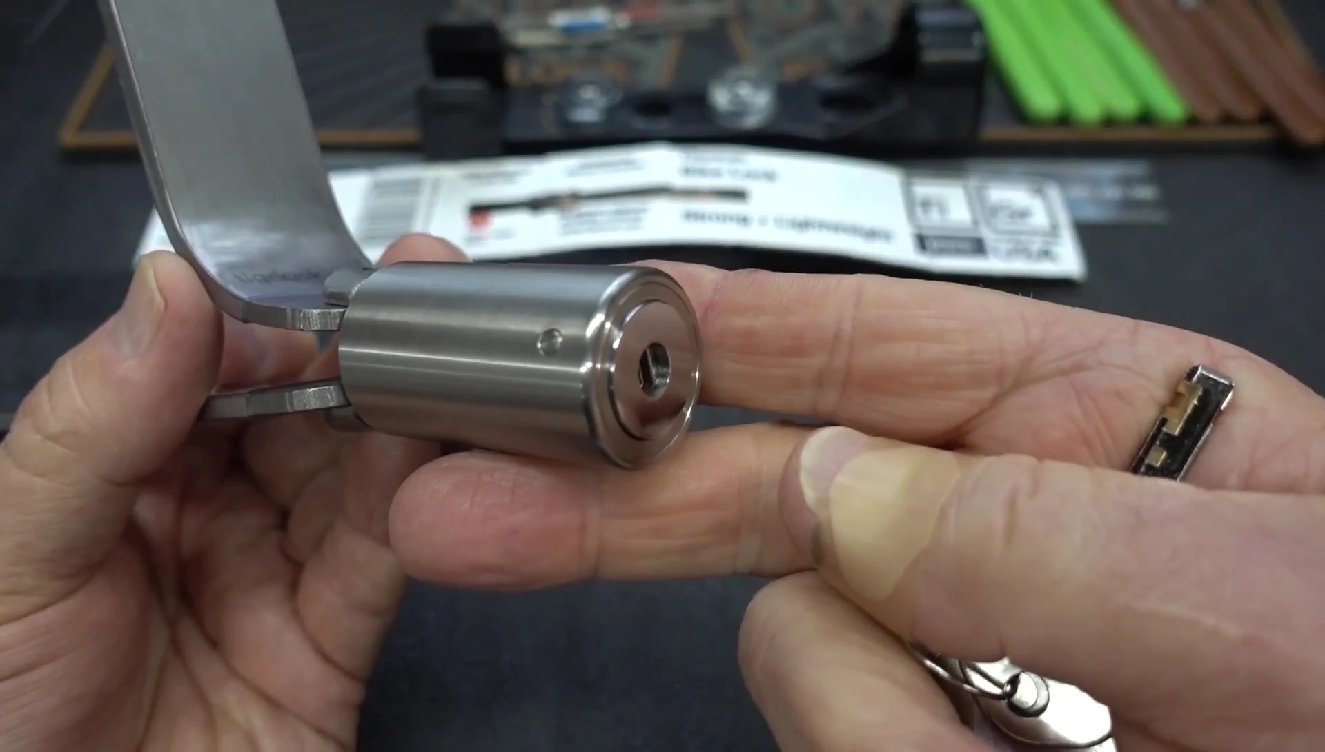 The reviewer attempting to pick the lock