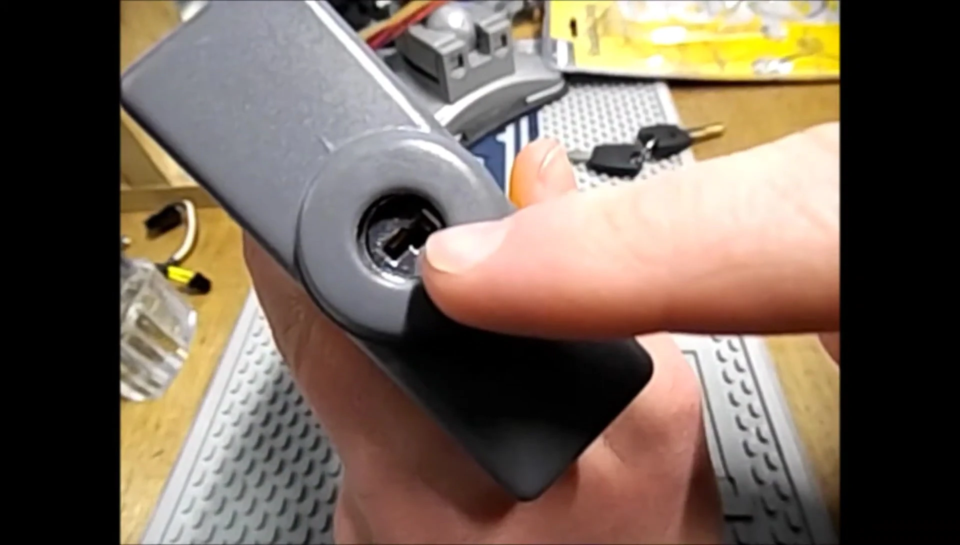 Close-up of the inner mechanism showing the large metal sliders