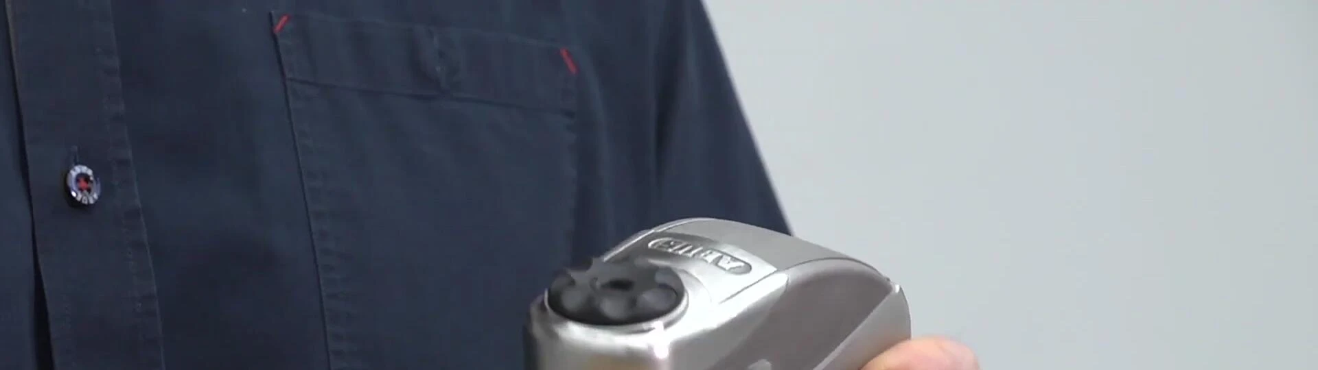 The ABUS Granite Detecto 8008 showcasing its polished stainless steel lock body.
