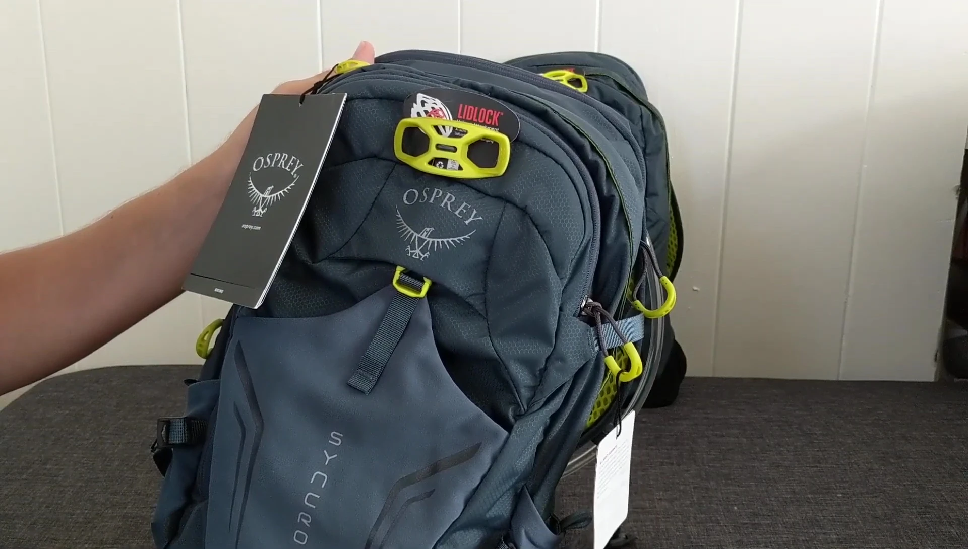 Demonstration of the helmet carrying system on one of the packs.