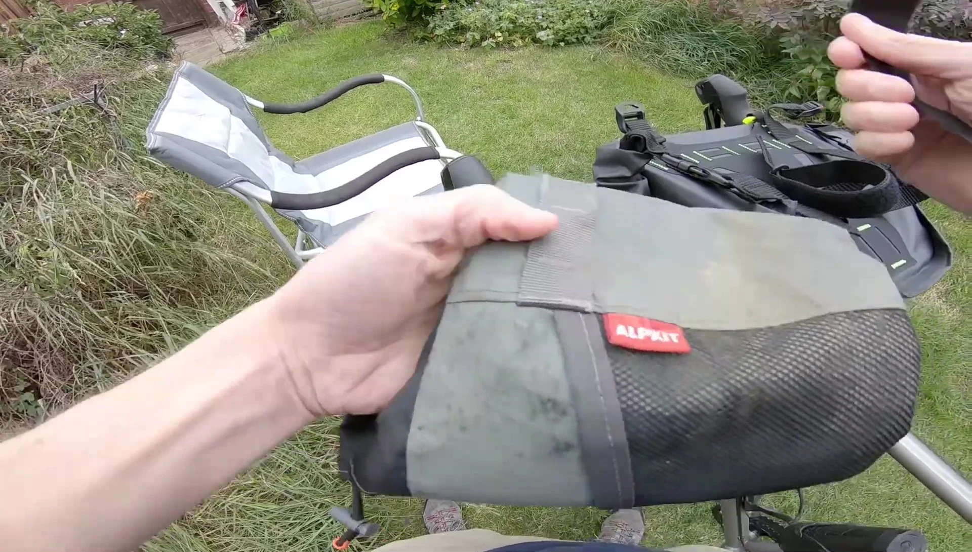 Velcro strap from bike stem being applied.