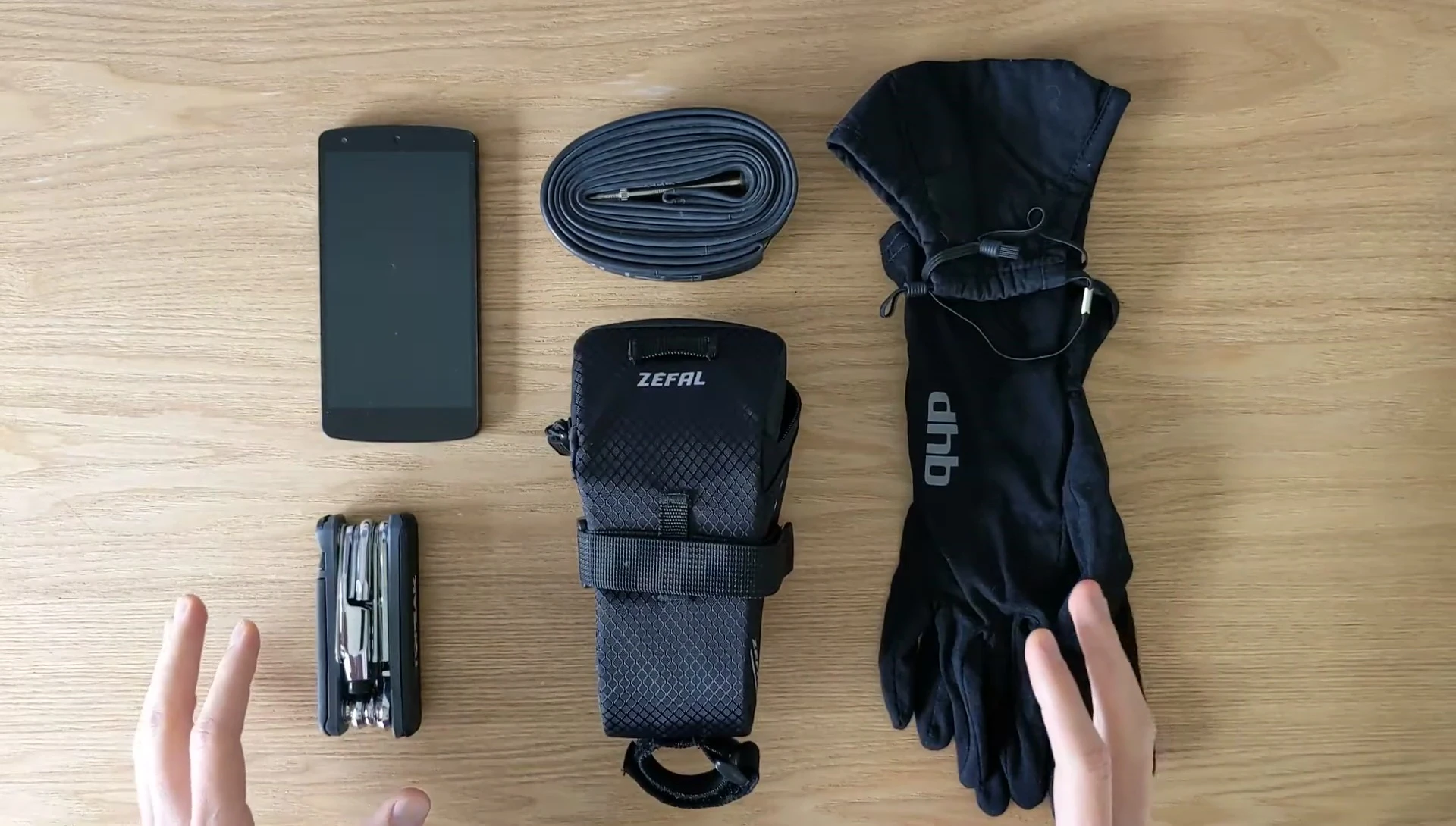 Various items neatly packed inside the saddle bag.