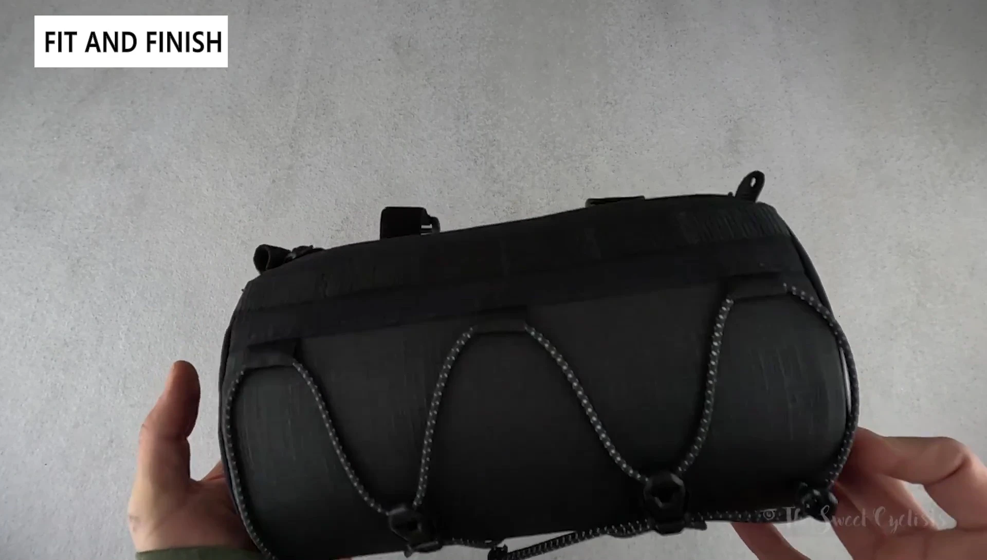 A shot of the bag's open interior, showing the internal divider and spacious main compartment.