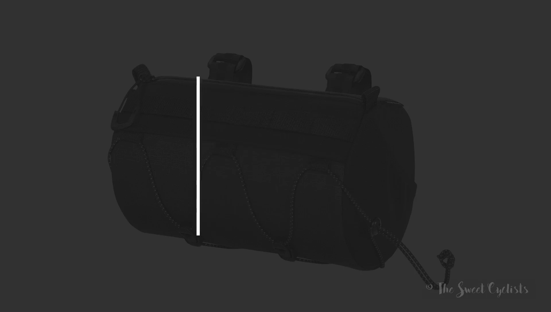 The bag mounted on a bicycle handlebar.