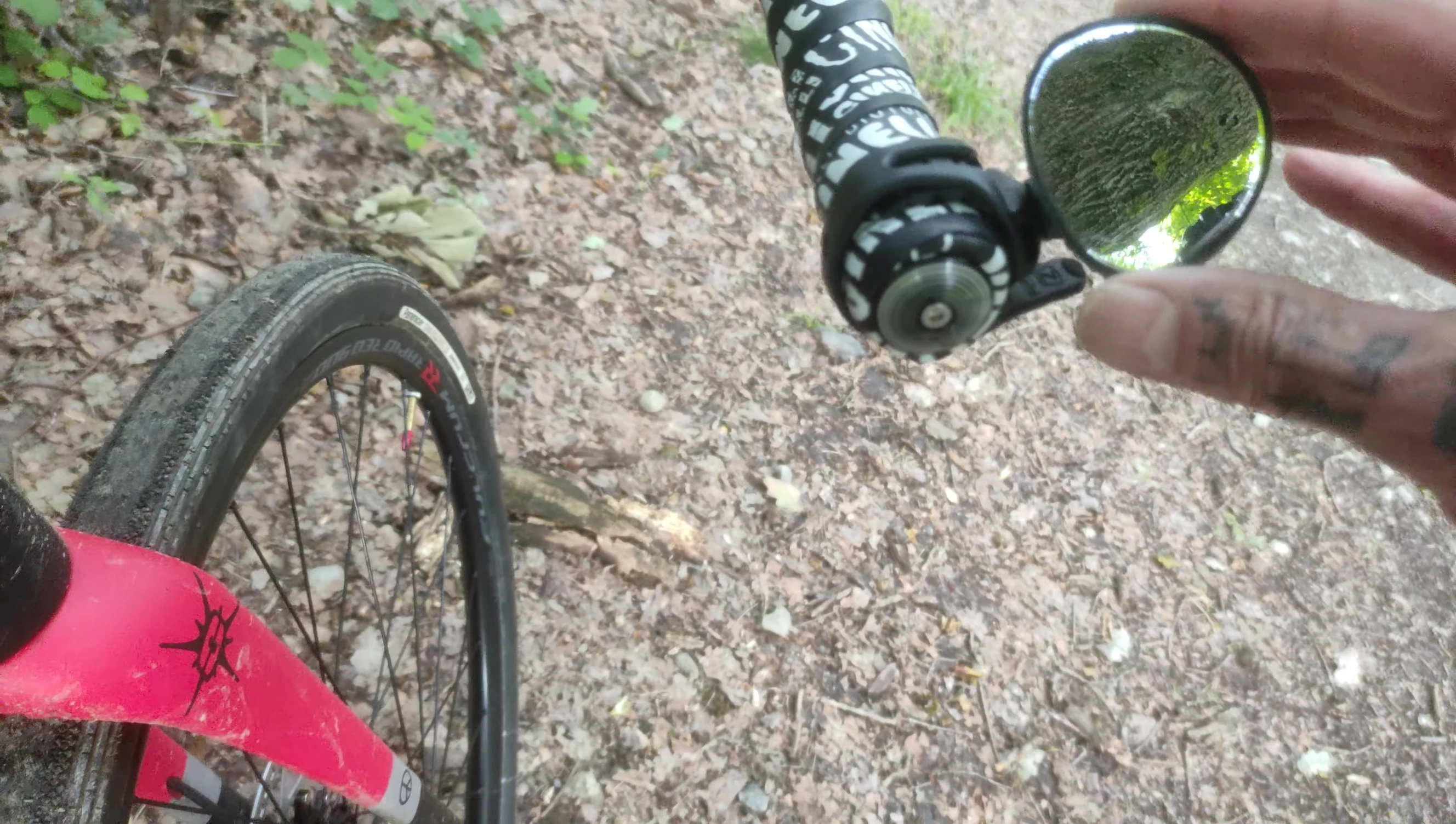 Close-up comparison of the Zefal and Cat Eye bike mirrors.