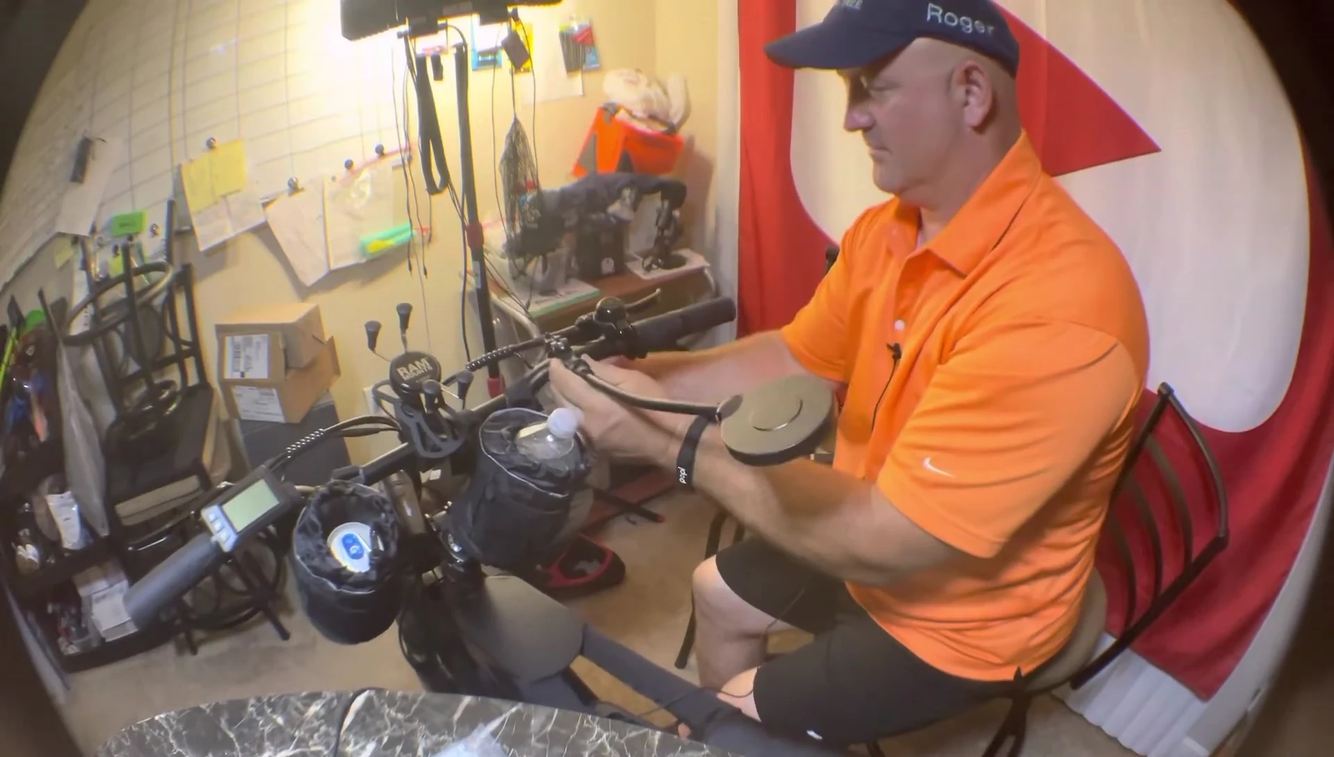 The mirrors partially installed on the handlebars.