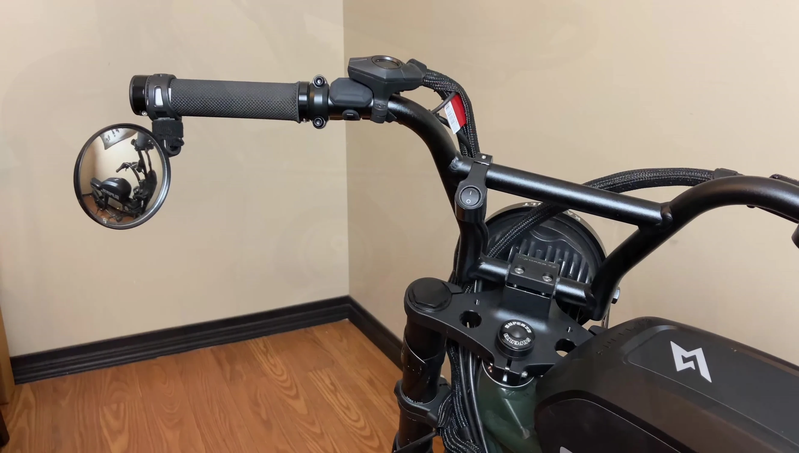 The reviewer showing his existing, cheap mirrors