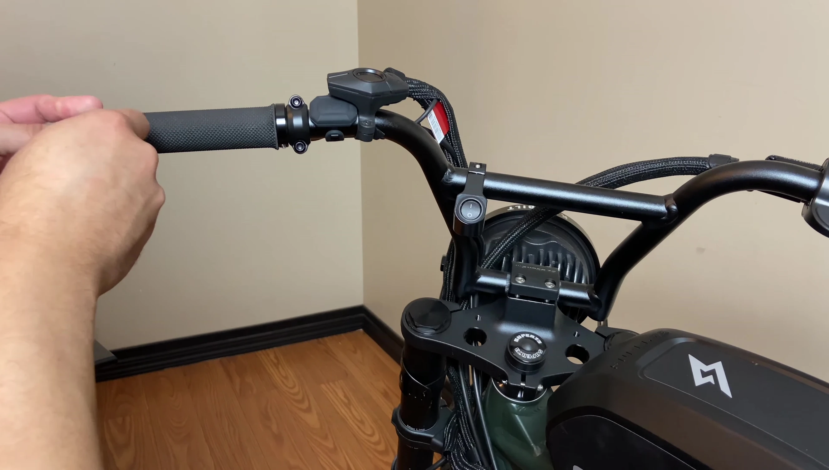 Removing the existing end cap from the handlebar