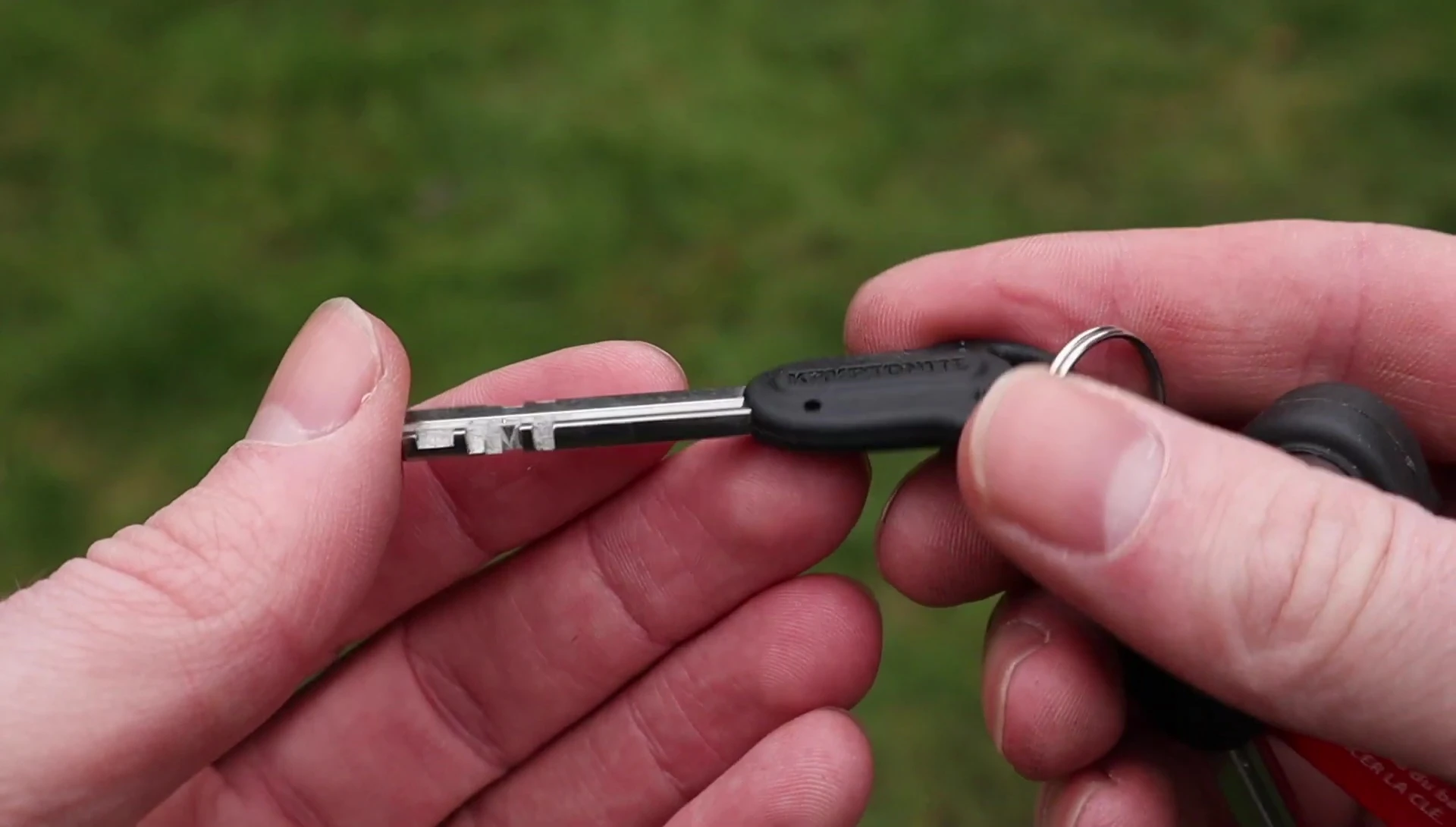 Close-up of the Fahgettaboudit Mini's key and cylinder