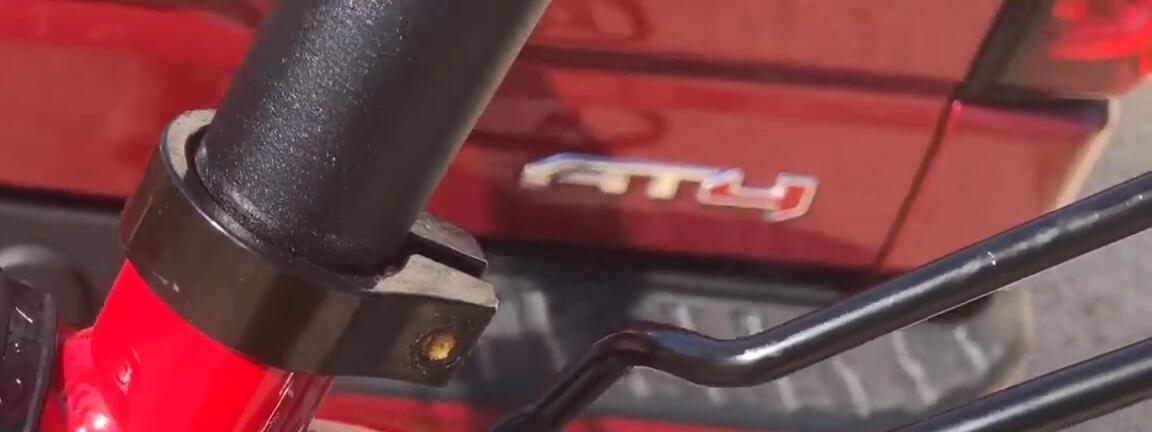 Close-up of the Packrat clip-on rear rack system.