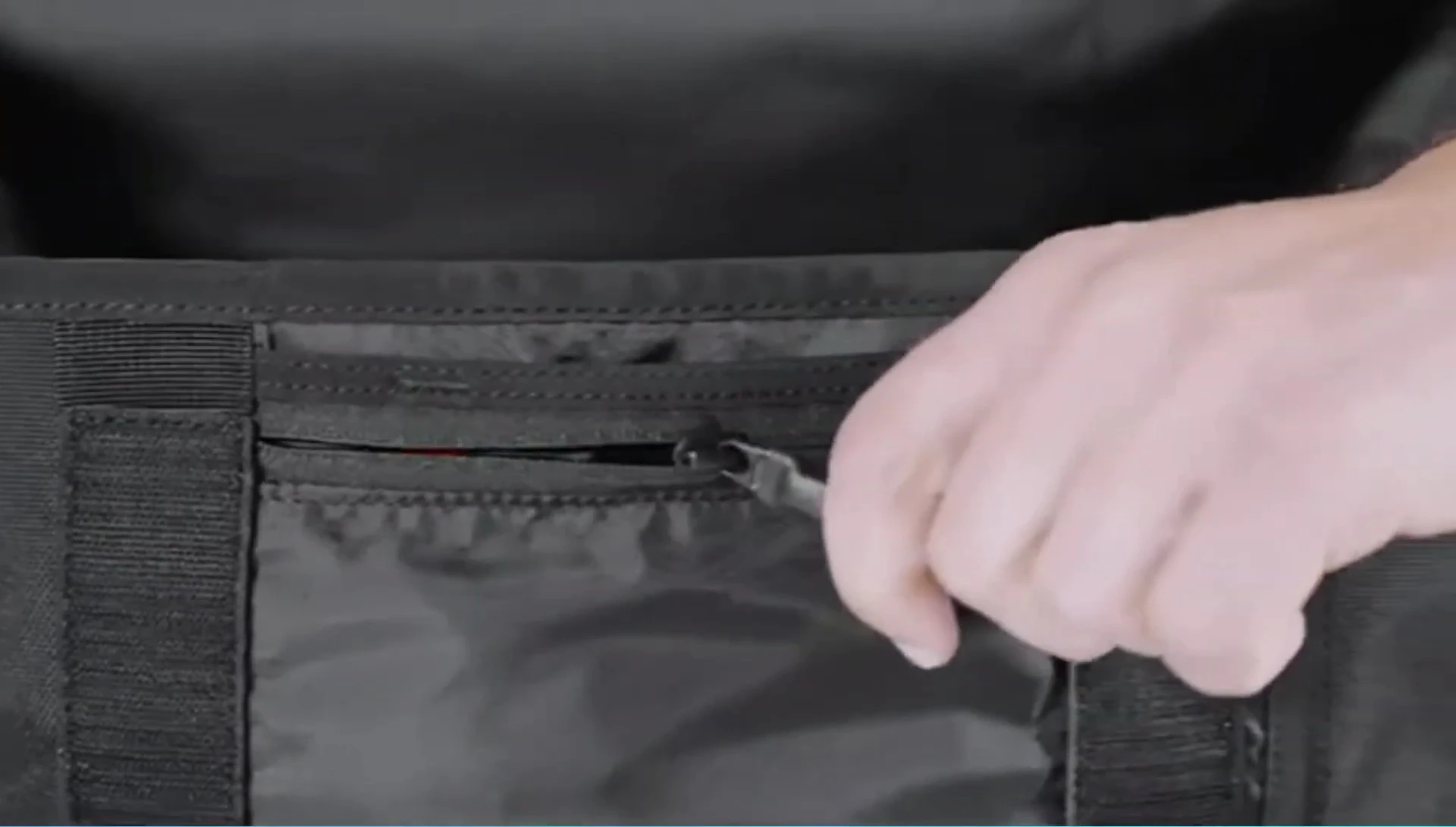 Close-up of the Timbuk2 bag's interior compartments and organizational features