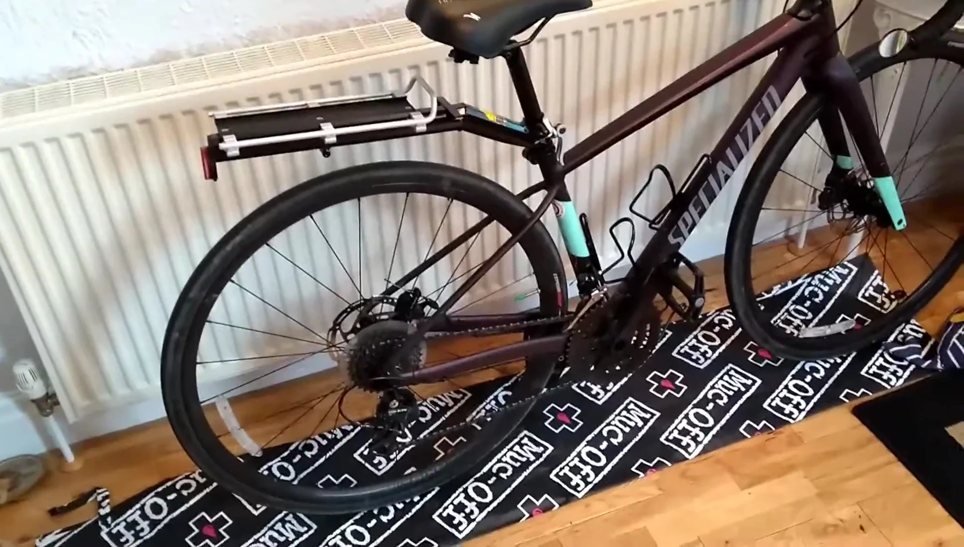 Image of a traditional pannier rack attached to a bicycle.