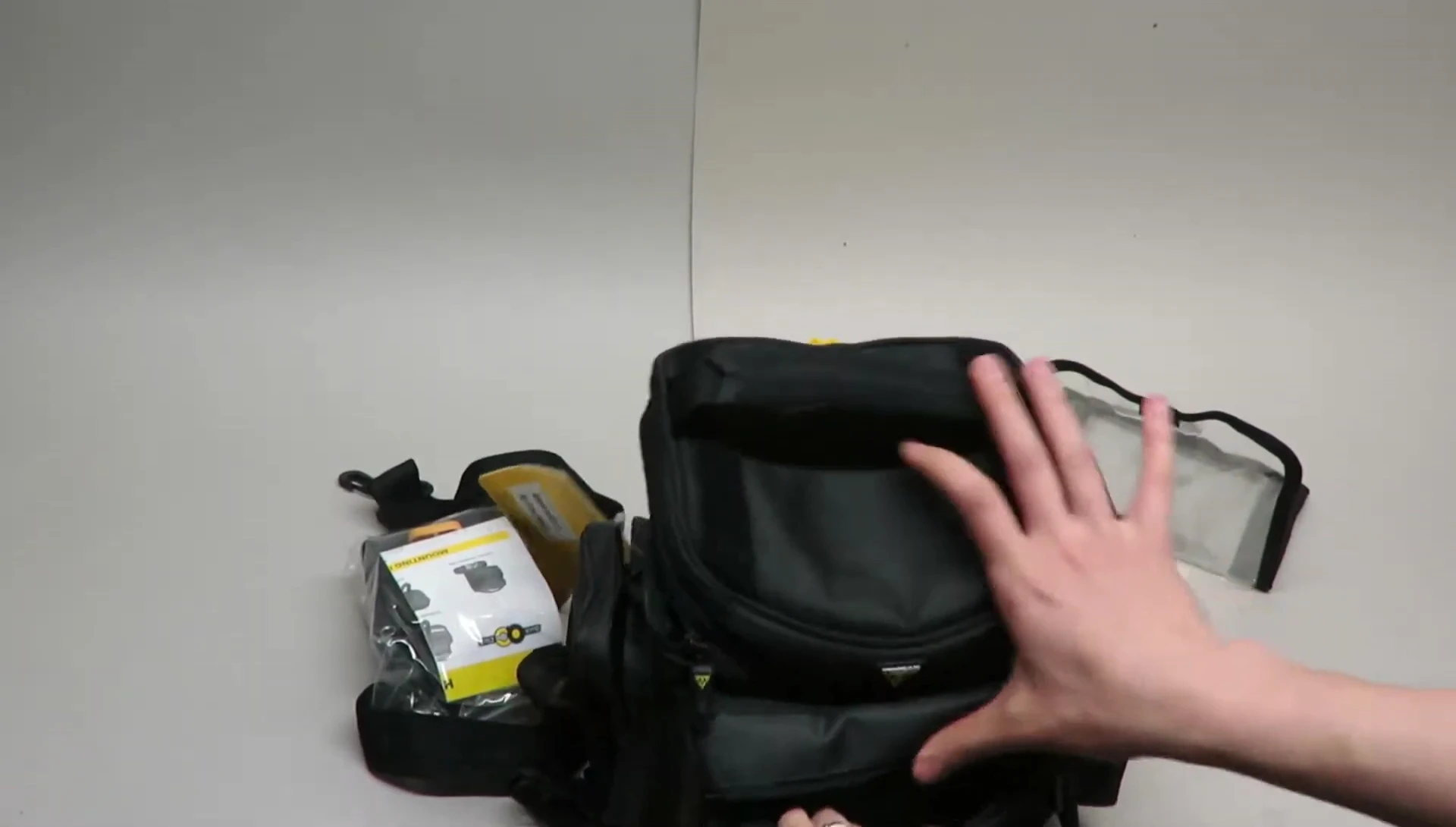 Interior of the large side pocket showing the soft lining