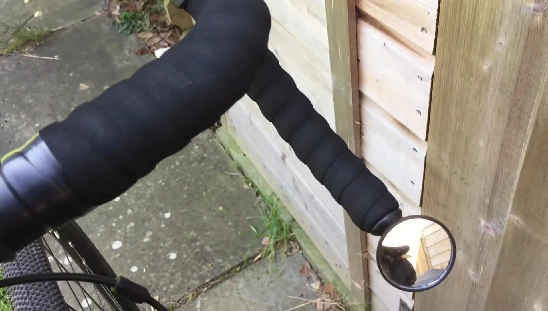 Close-up of the Cateye BM-45 being installed on the handlebar.