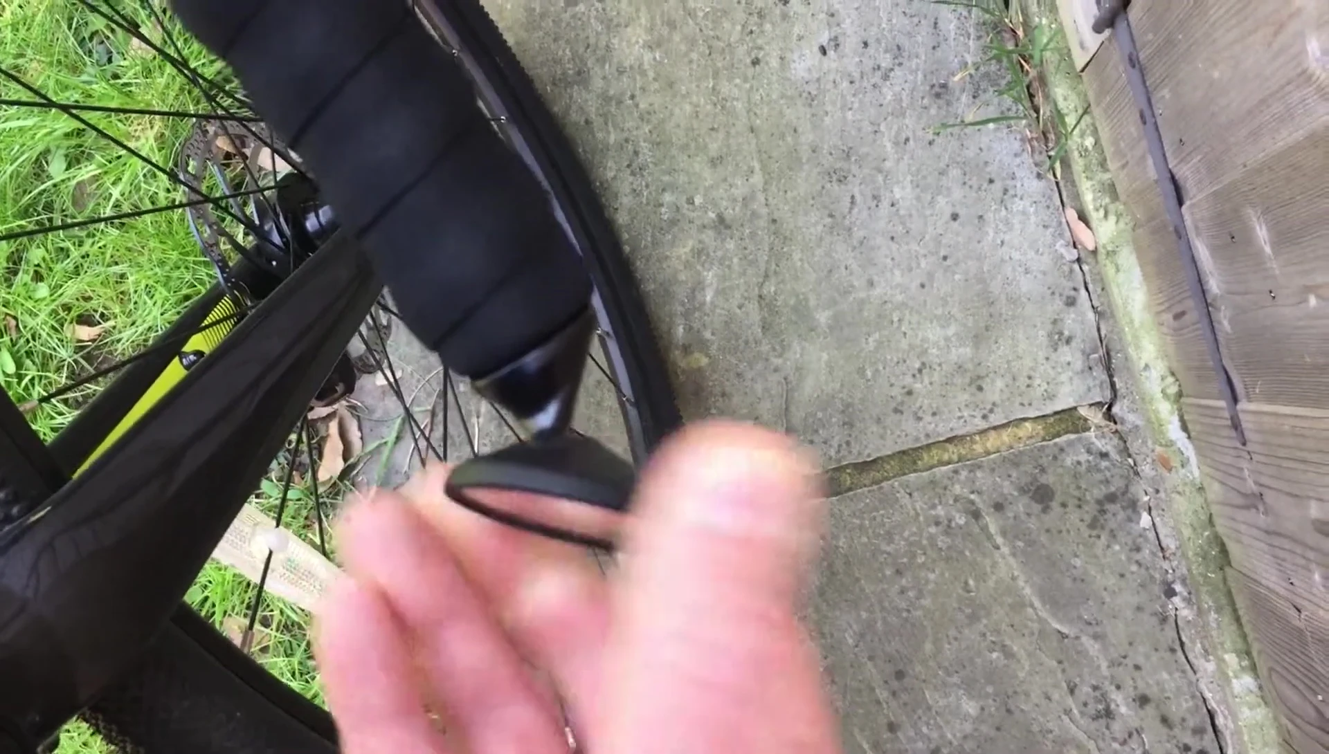 The mirror's articulated ball joint, demonstrating its adjustability.