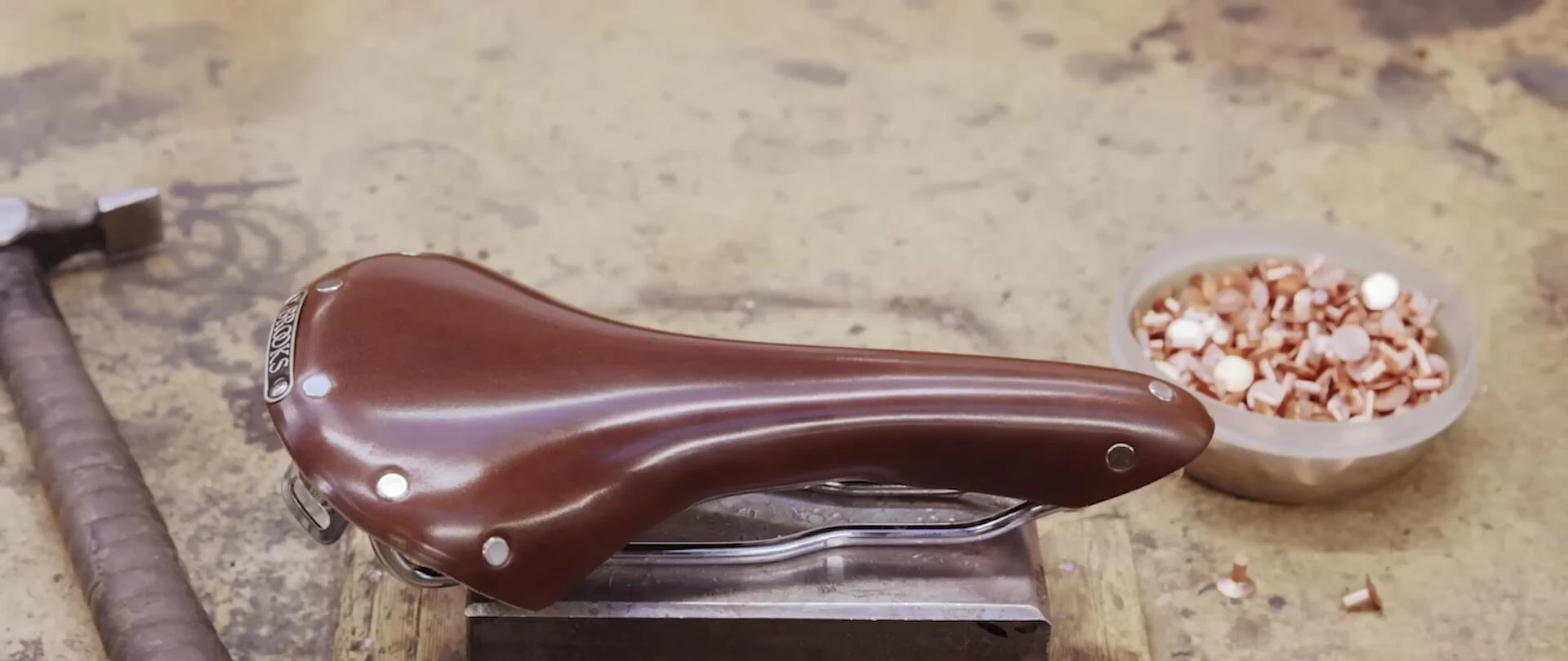 A collection of Brooks Unique line saddles, demonstrating the variety of unique designs.