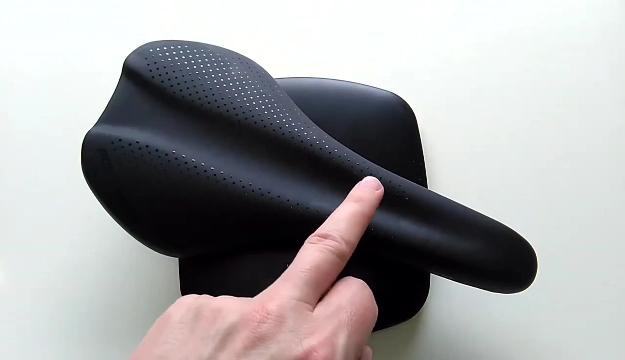 Close-up showing the saddle's shape and how it can support different riding positions.