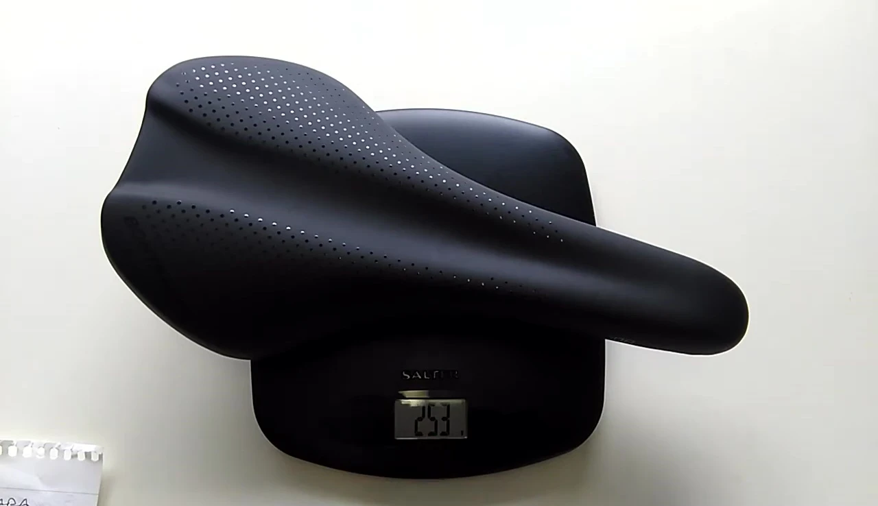 Close-up of the saddle on a scale showing the weight.