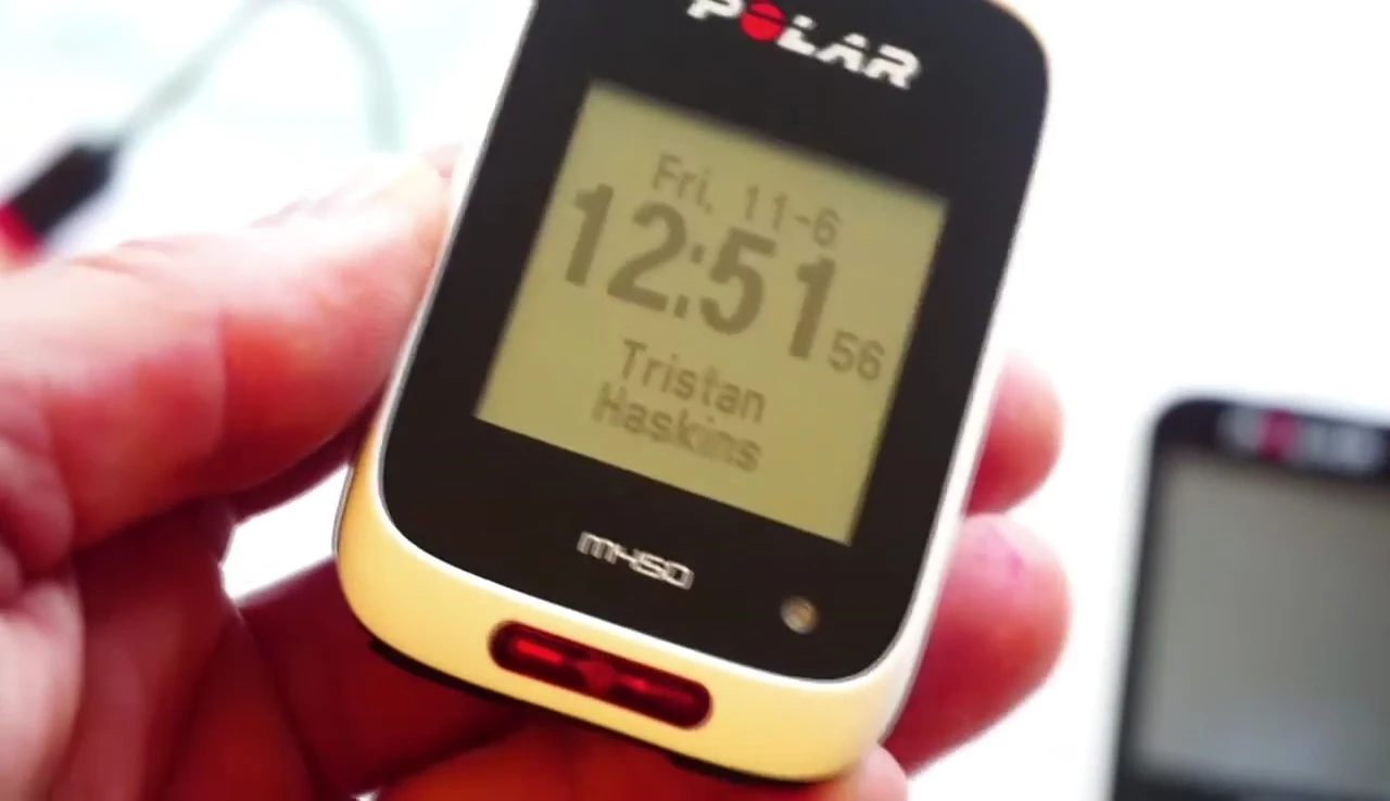 Side-by-side view of the Polar M450 and Garmin Edge 400, emphasizing size similarity.