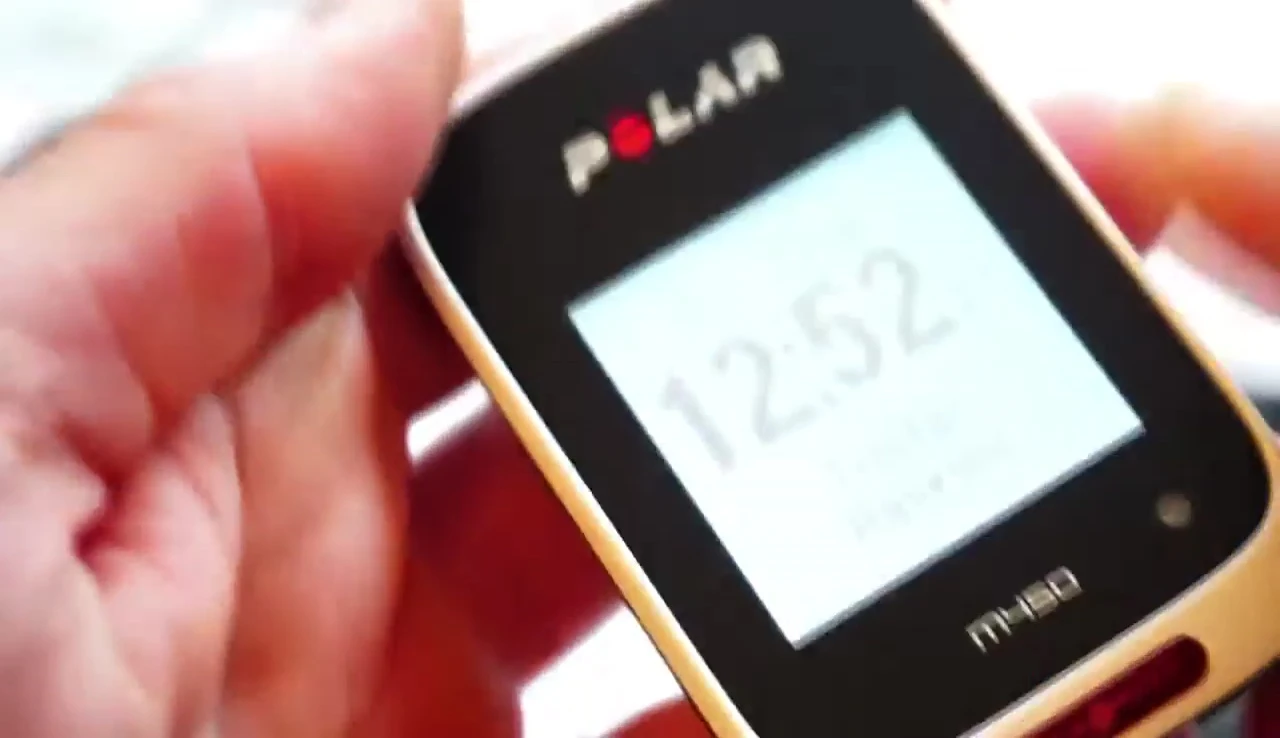 Close-up of the Garmin Edge 25 buttons and backlight.