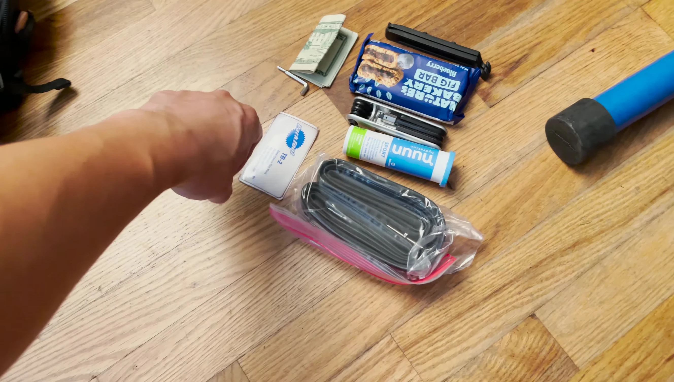 All items are removed from the saddle bag, ready to be transferred.