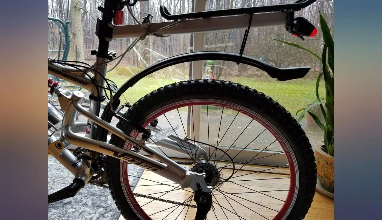 The fenders installed on the bike, highlighting their sleek appearance.