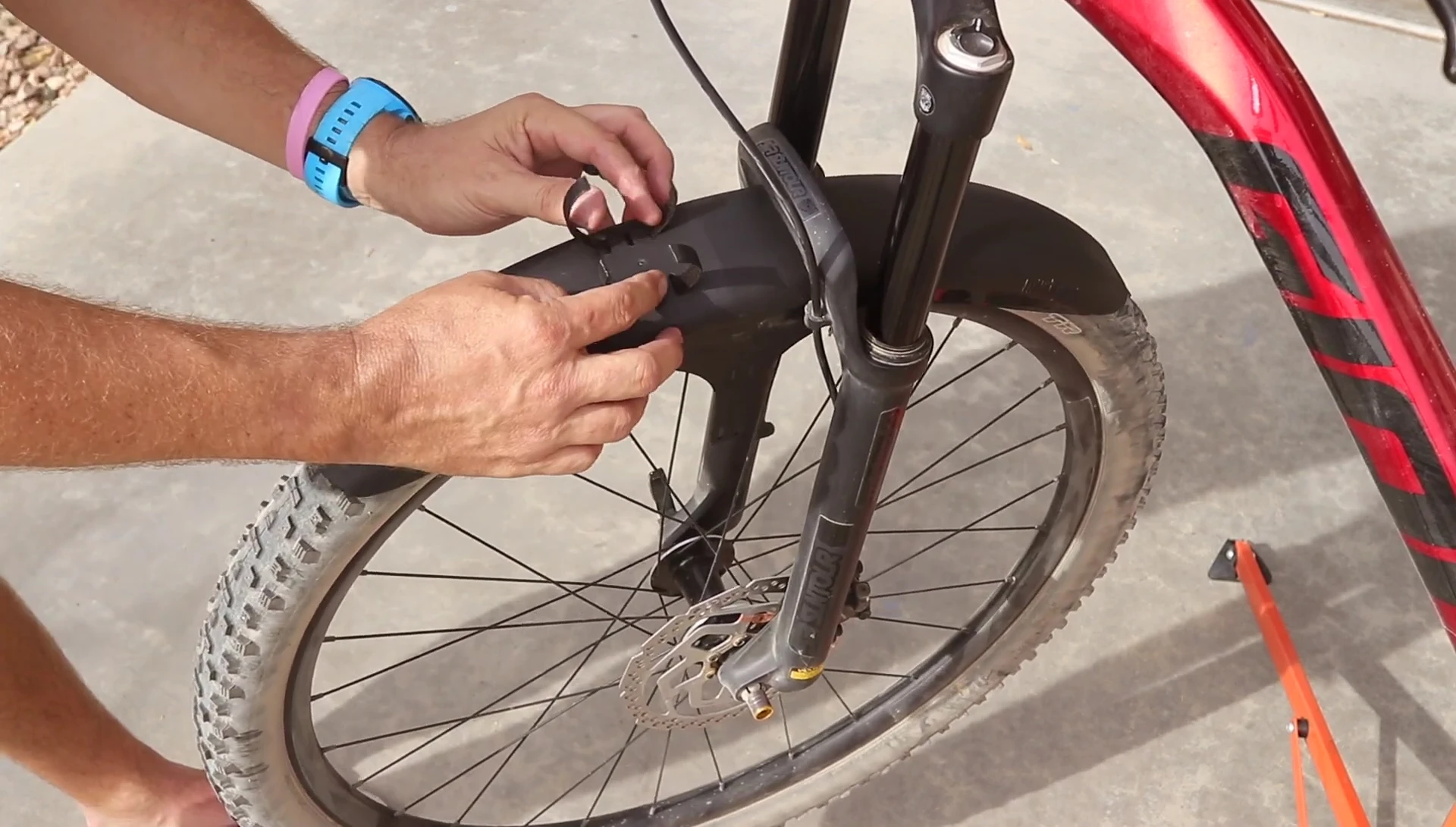 Mudguards securely attached to a bike.