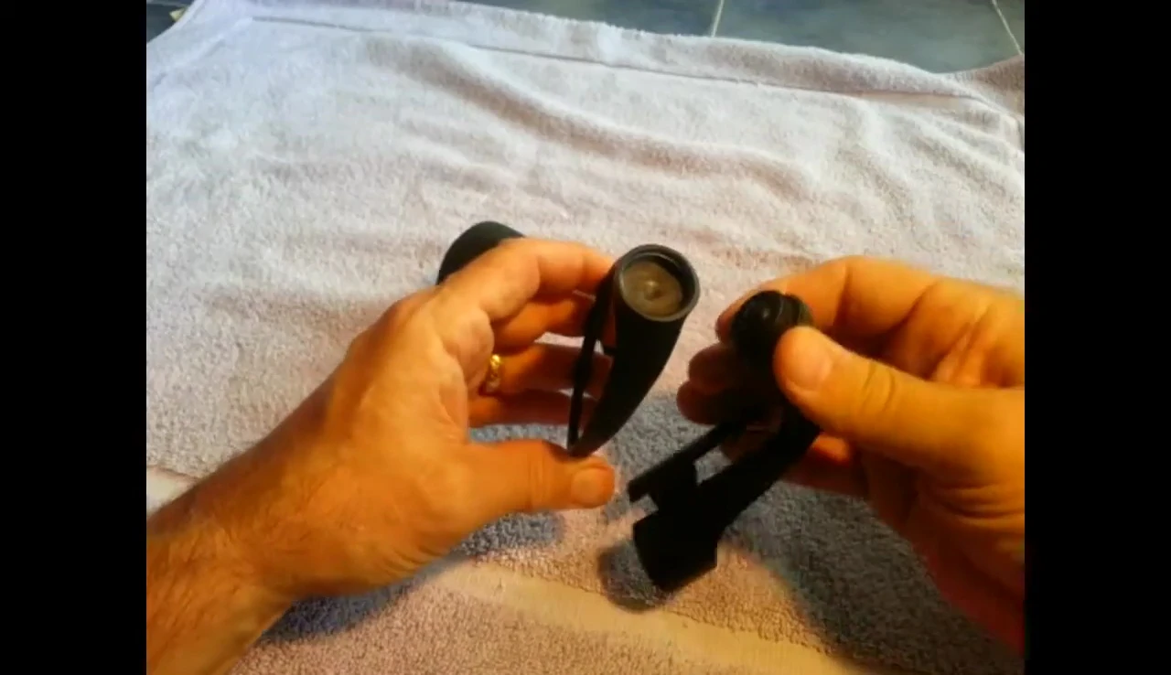 Close-up of the mirror's ball and socket joint with inner tube disc inserted.