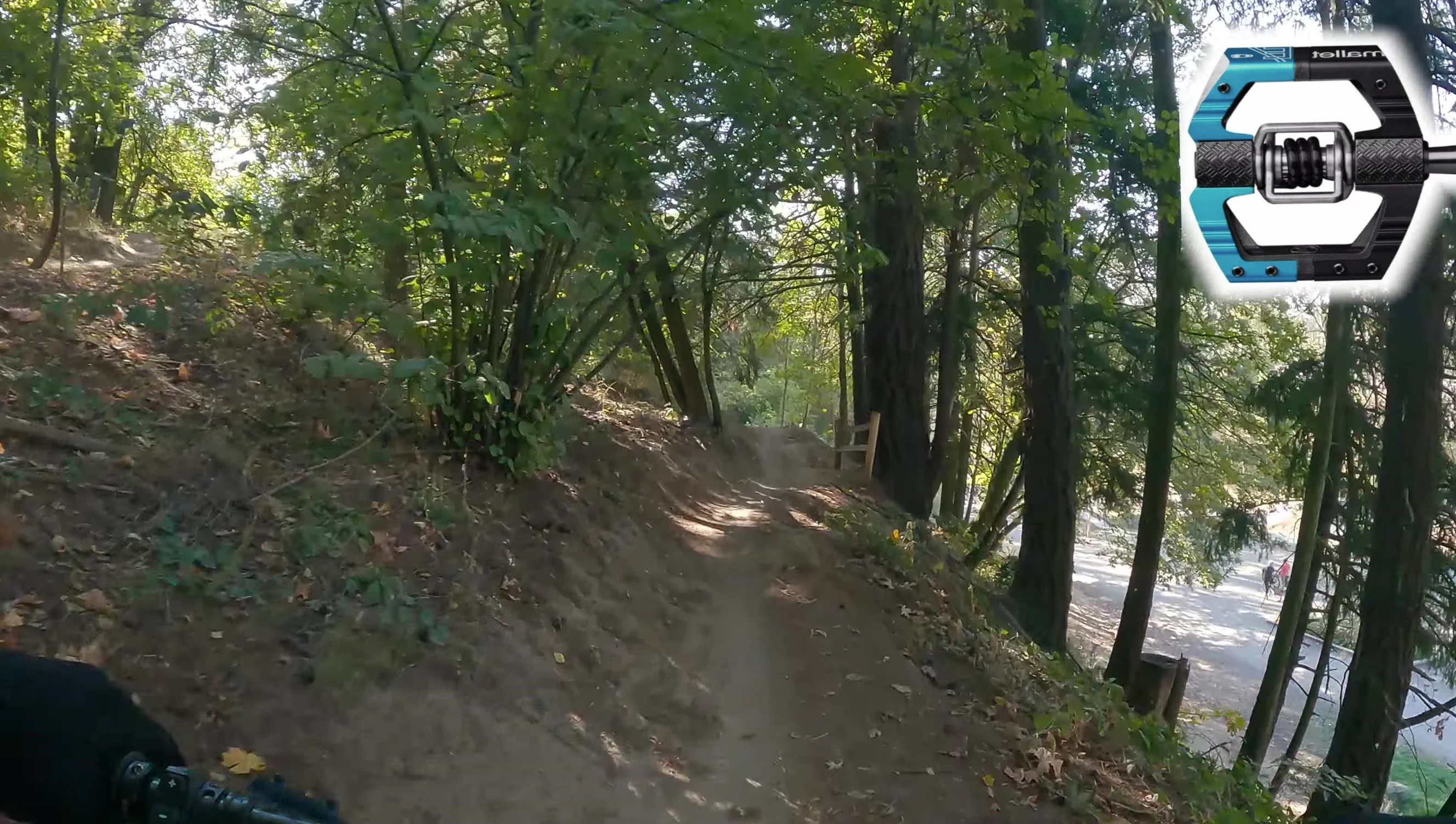 The narrator demonstrating the secure feel of the Crankbrothers pedals during jumps.