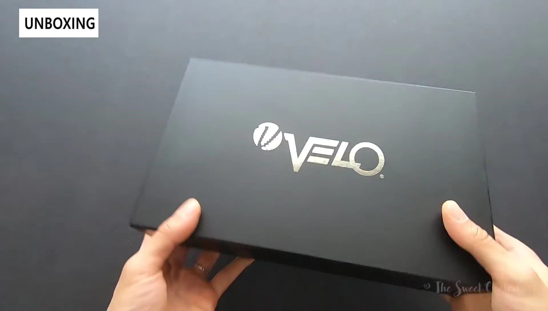 Close-up of the saddle being taken out of the box.