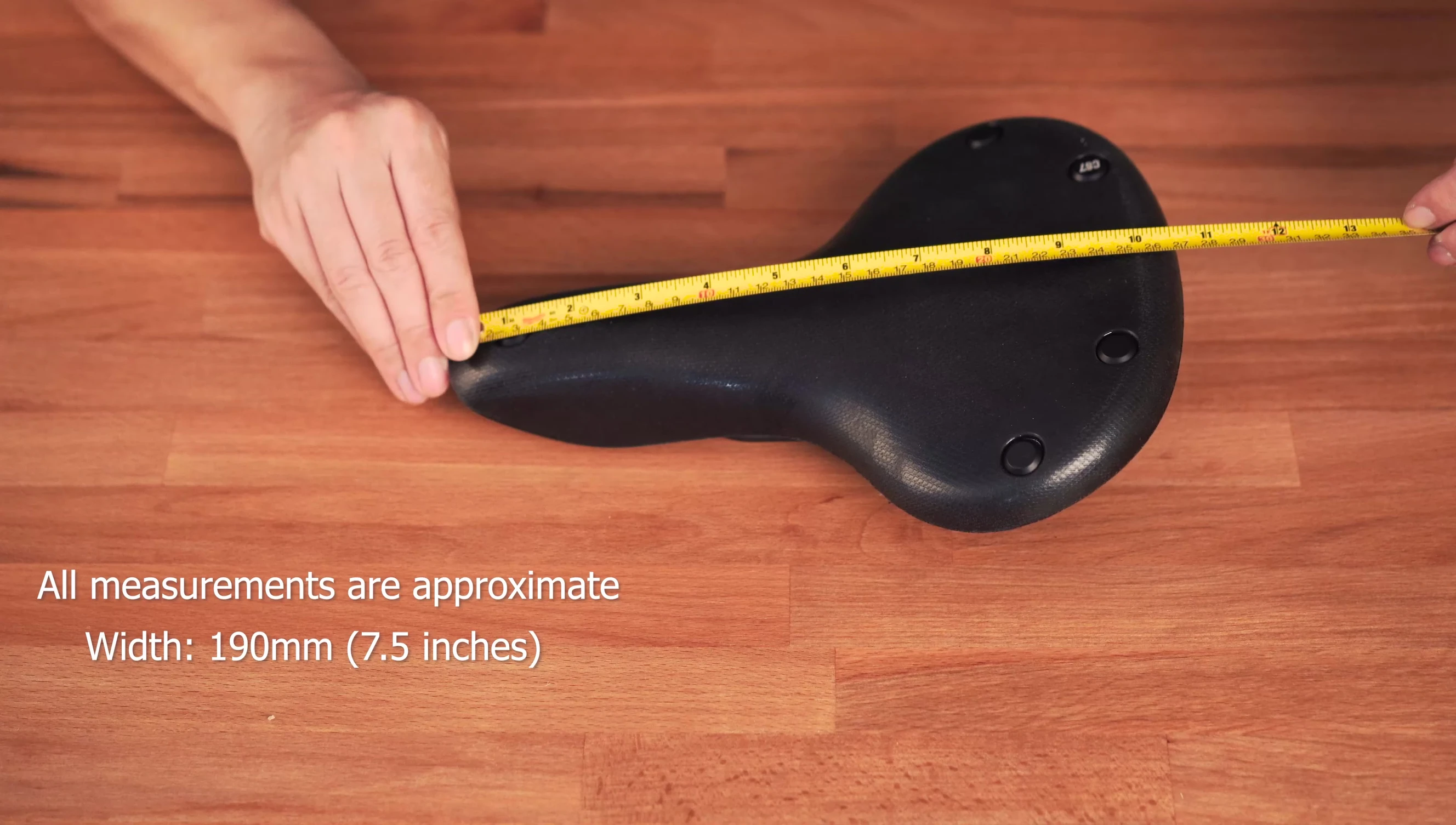 Measurements being taken to determine the length of the saddle