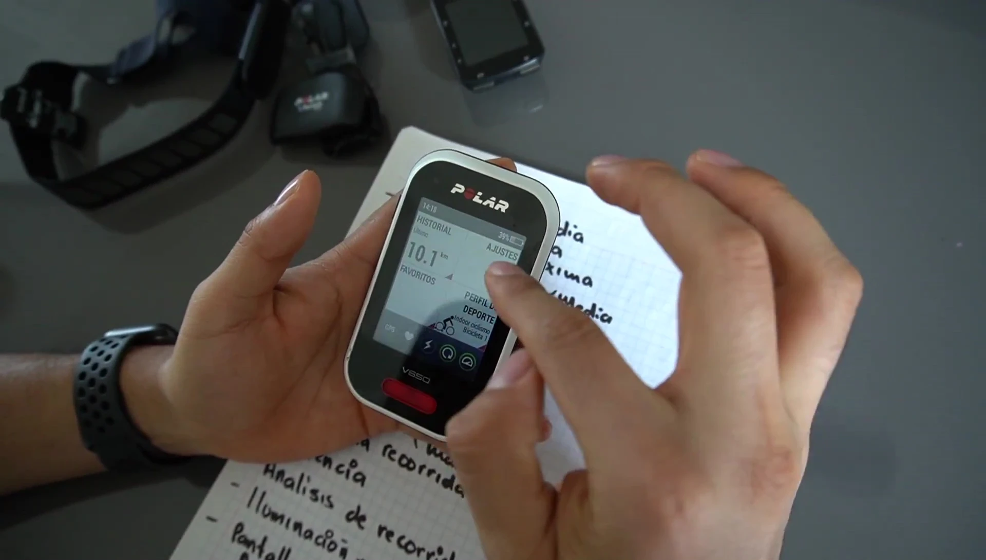 The reviewer discusses issues with the Garmin touchscreen in wet conditions.